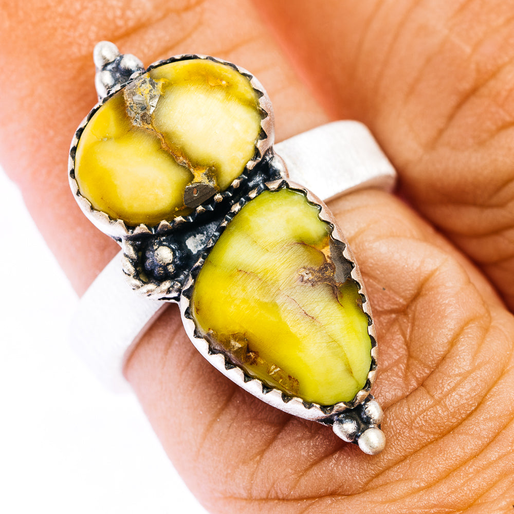 Sterling silver adjustable ring with two oval yellow gemstone cabochons and beaded accents