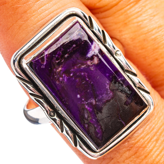 Sterling silver sugilite ring with rectangular purple gemstone set in a raised bezel