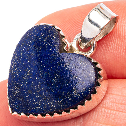 Lapis lazuli heart pendant in .925 sterling silver with blue stone and scalloped edge