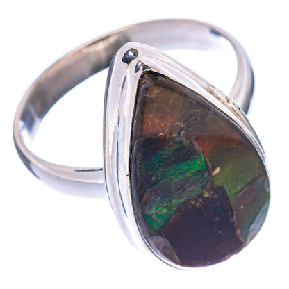 Sterling silver ammolite ring, oval gemstone in raised bezel with dark iridescent greens