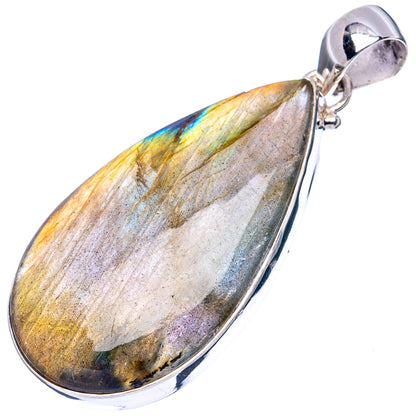Labradorite teardrop pendant with iridescent blue-gold flash in sterling silver frame