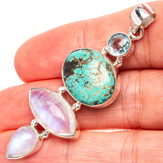 Sterling silver pendant with turquoise round cabochon, moonstone ovals, blue accents
