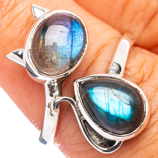 Sterling silver cat ring with two oval labradorite cabochons, blue and gray flash