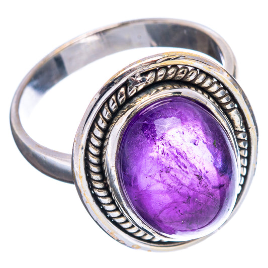 Oval amethyst cabochon ring, .925 sterling silver, detailed rope border and open shank