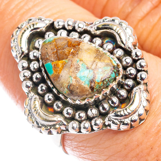 Sterling silver turquoise ring with teardrop cabochon, green-blue stone in beaded setting