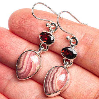 Sterling silver drop earrings with red rhodochrosite heart and dark red faceted stones
