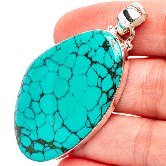 Turquoise teardrop pendant with cracked-stone pattern, .925 sterling silver bail