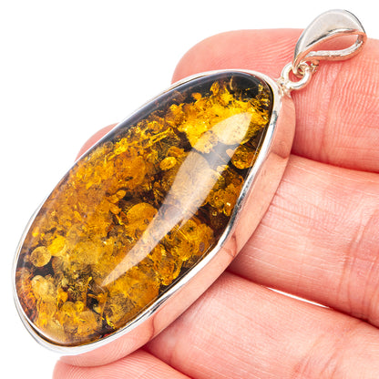 925 sterling silver pendant with oval honey Baltic amber cabochon