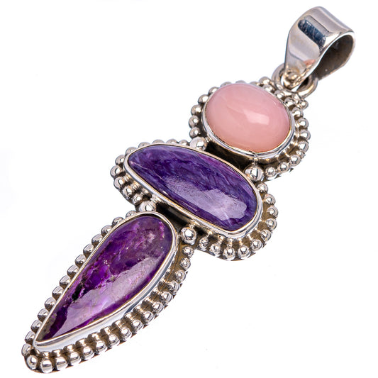 Sterling silver pendant with pink oval cabochon, two purple oval cabochons, top bail