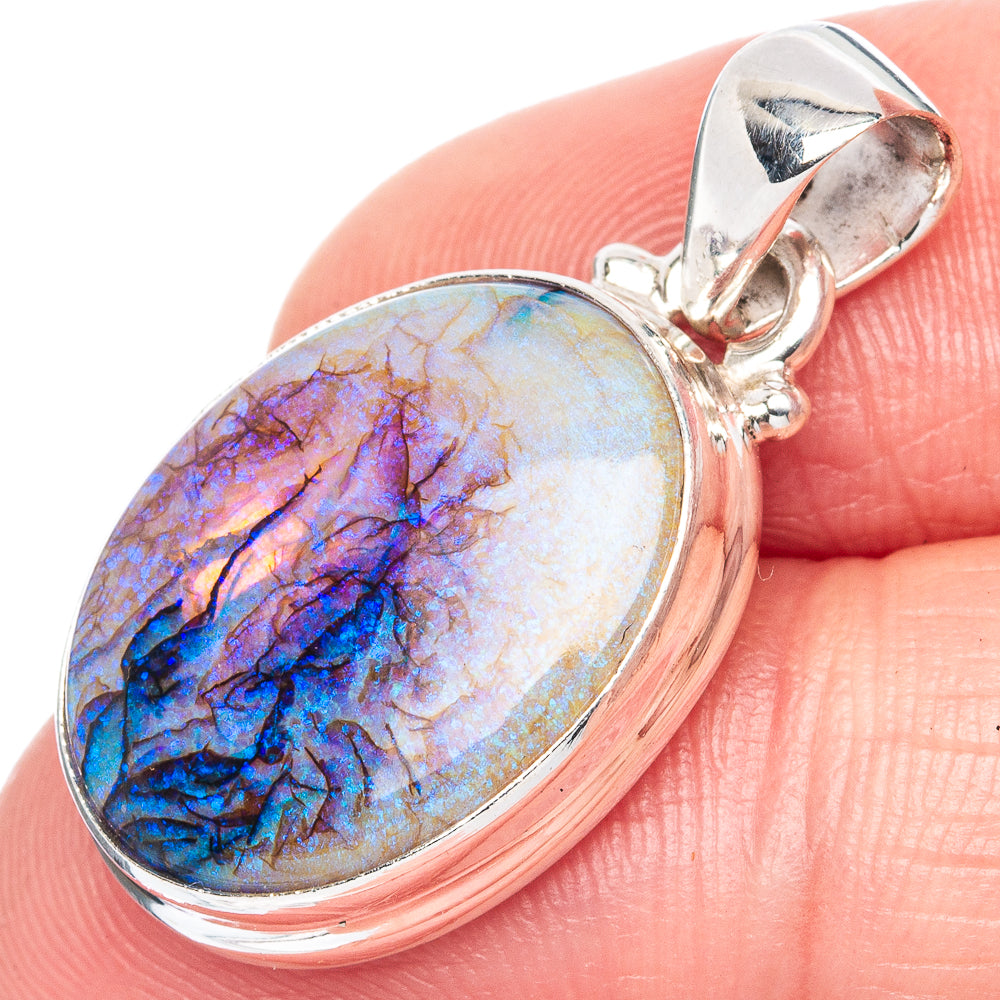 Oval blue-purple opal pendant in 925 sterling silver bezel with bail