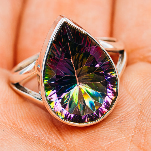 Silver teardrop mystic topaz ring, prong-set faceted rainbow stone on band