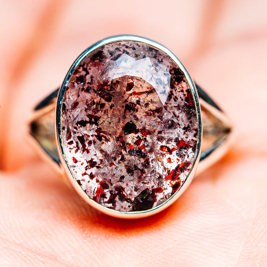 Oval .925 sterling silver ring with faceted lepidocrocite gemstone, dark speckled pattern