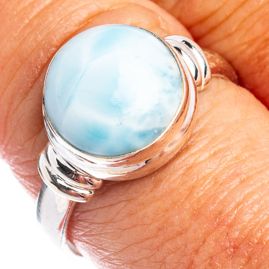 Sterling silver larimar ring with domed round blue stone and polished twisted bezel