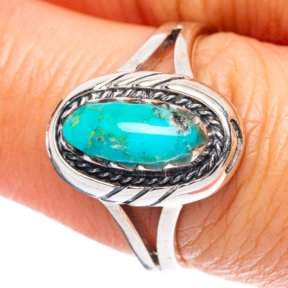 Sterling silver oval turquoise cabochon ring with ornate braided metalwork, size 7.5