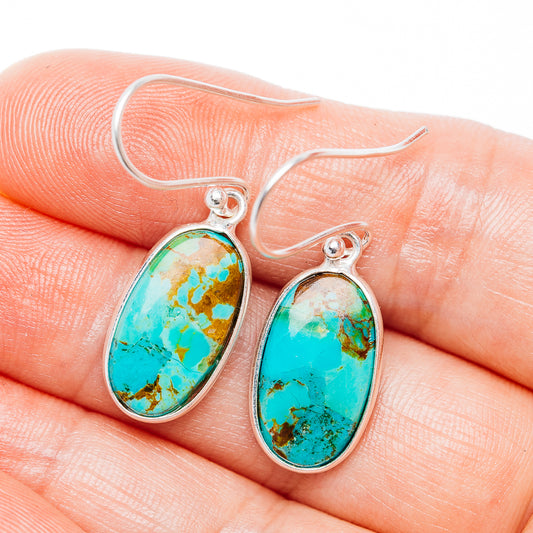 Oval turquoise drop earrings in .925 sterling silver with green-brown matrix