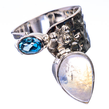 Sterling silver ring with blue oval gemstone, moonstone teardrop, and raised bubble texture