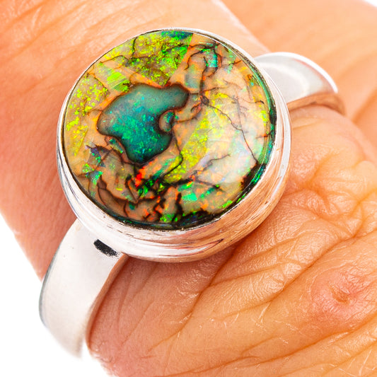 Sterling silver opal cabochon ring with multicolor green and orange stone, size 6.75