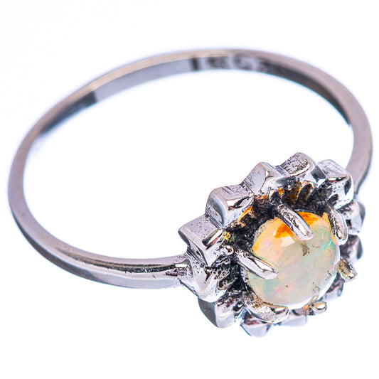 .925 sterling silver opal ring with raised flower setting and dark prong accents