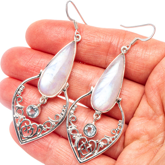 Sterling silver drop earrings with iridescent moonstone, filigree heart, blue topaz accents