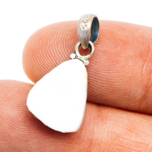 Sterling silver pendant back with bail and heart-shaped white backing.