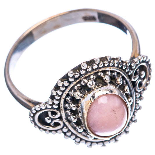 Pink opal sterling silver cocktail ring with detailed halo setting and open scroll band