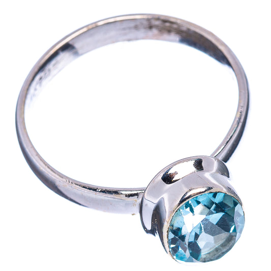 Sterling silver blue topaz ring, round faceted stone in raised bezel