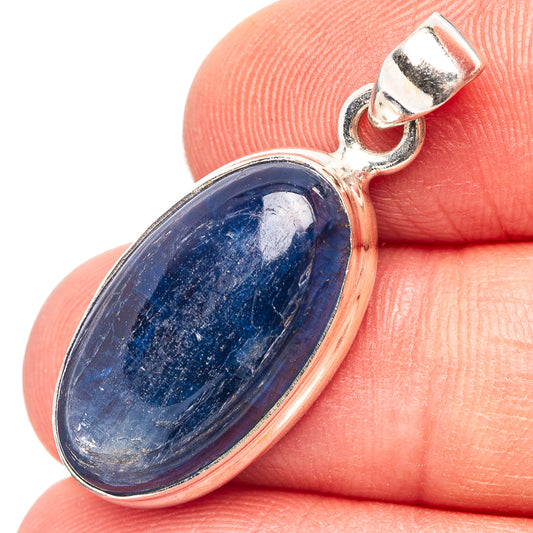 Sterling silver kyanite pendant with oval blue gemstone bezel and top bail