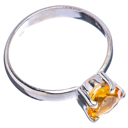 Sterling silver citrine ring, round band with faceted yellow gemstone in prongs