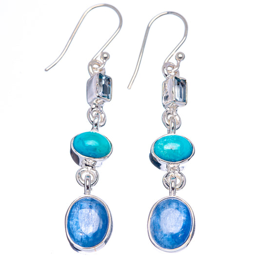 Sterling silver drop earrings with turquoise and blue oval gemstones and rectangular blue accents
