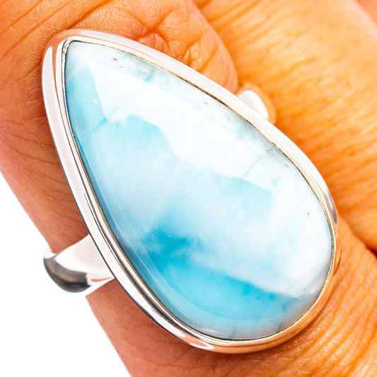 Sterling silver larimar ring with teardrop blue cabochon in polished bezel