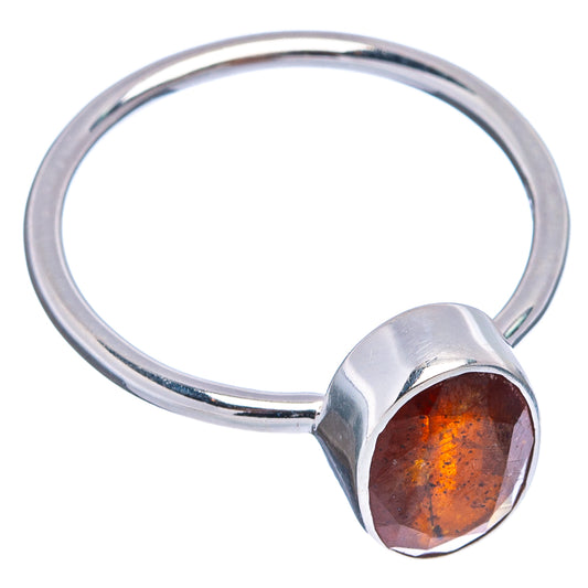 Orange kyanite oval gemstone ring with .925 sterling silver bezel and rounded band