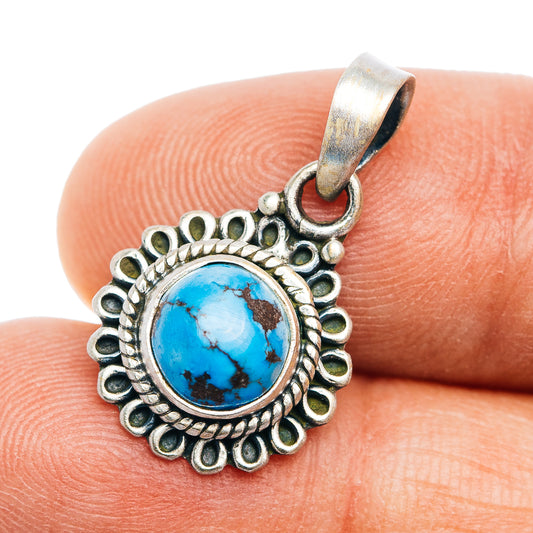 Sterling silver turquoise pendant with round blue cabochon and ornate scalloped rim