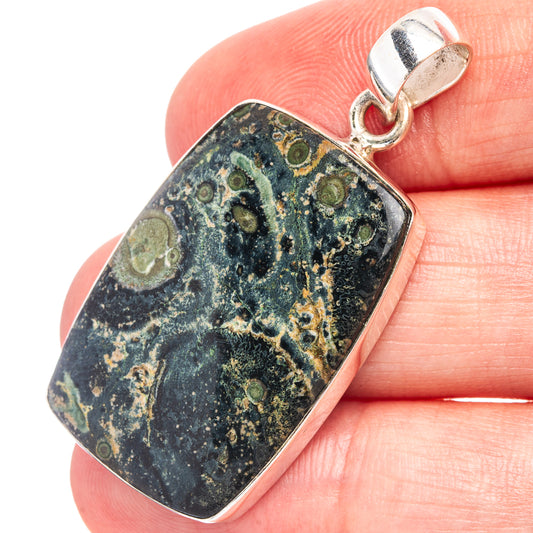Sterling silver jasper pendant with blue, green and gold mottled stone in a bezel