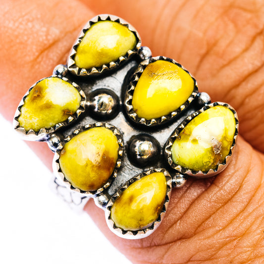 Adjustable silver ring with six oval yellow stones and scalloped settings