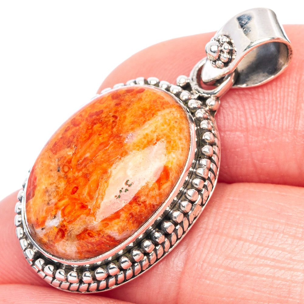 Orange sponge coral oval pendant in 925 sterling silver with beaded border