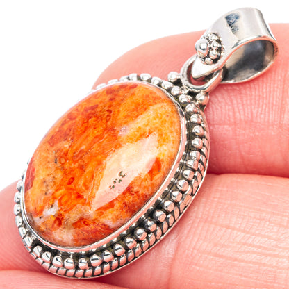 Orange sponge coral oval pendant in 925 sterling silver with beaded border