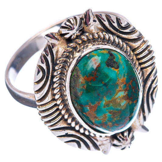 Sterling silver turquoise oval ring, openwork engraved band and oval stone; size 8.75