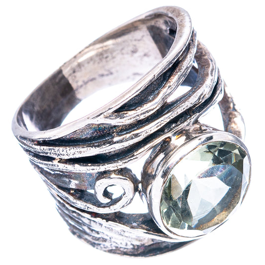 Sterling silver ring with oval green amethyst and twisted swirl band design
