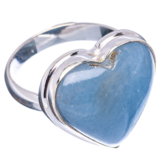 Blue heart gemstone ring, heart face in silver setting on polished band