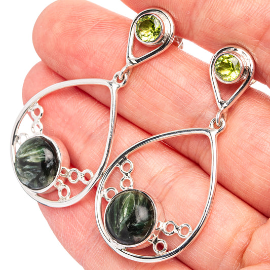 Sterling silver drop earrings with teardrop serpentine and green peridot accents