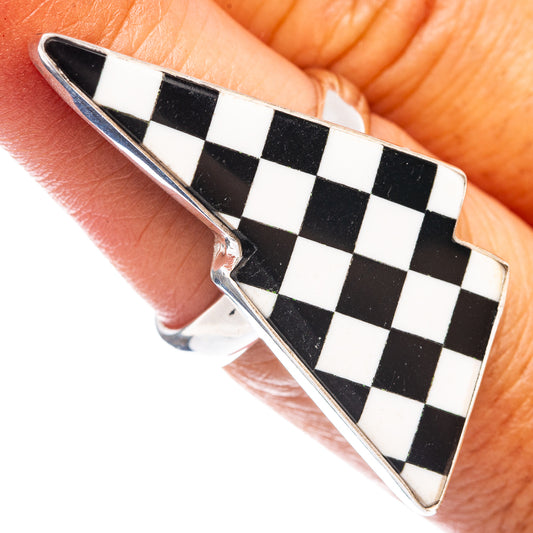 Checkered onyx-style bolt ring on .925 sterling silver band, black and white pattern