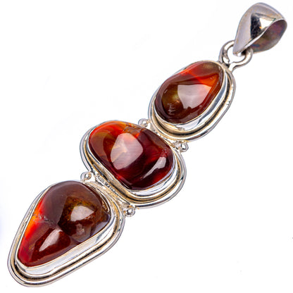 Sterling silver fire agate pendant with three oval stones in red and dark tones