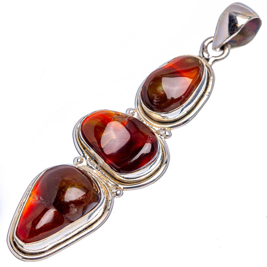 Sterling silver fire agate pendant with three oval stones in red and dark tones