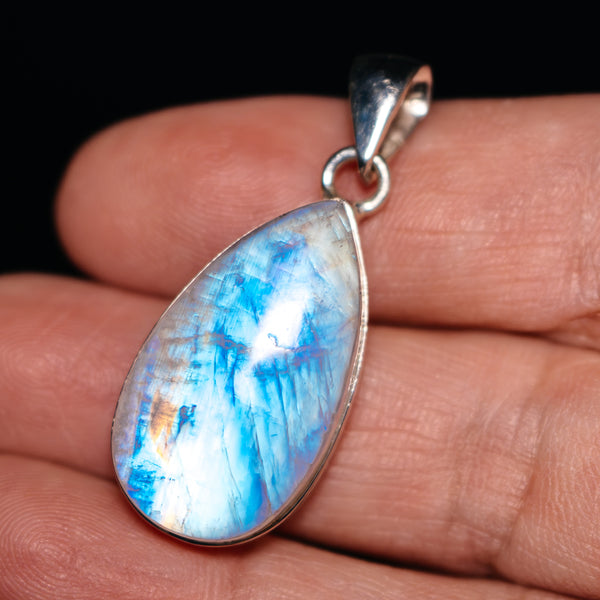 Sterling silver moonstone pendant, teardrop bezel with blue iridescent flash