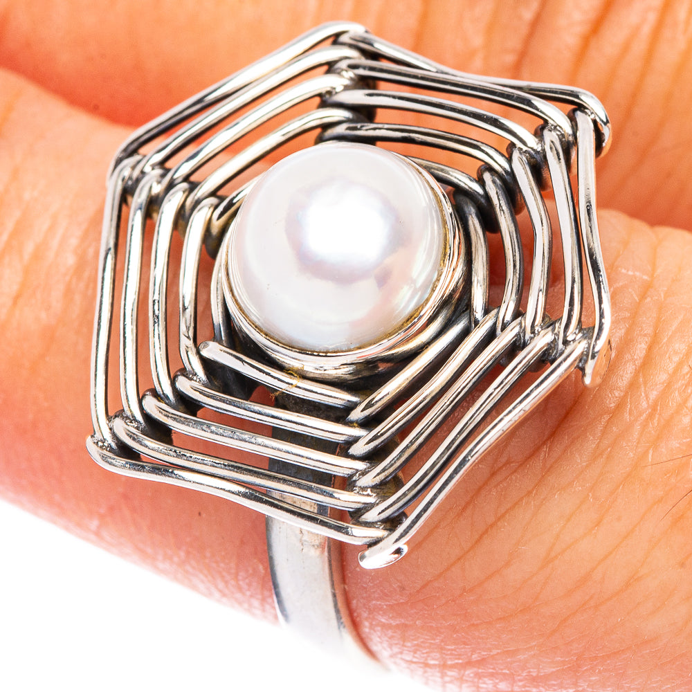 Sterling silver cultured pearl ring with spiral cage setting