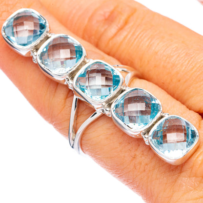Oval blue topaz-style ring with five faceted stones on 925 sterling silver band