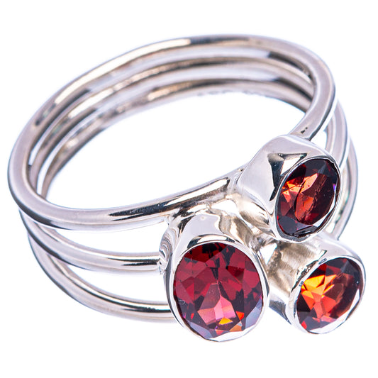 Sterling silver three-stone ring with round red gemstones, size 6.5, side view