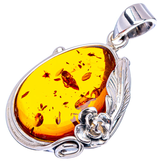 Oval yellow Baltic amber pendant with rose detail and 925 sterling silver leaf frame