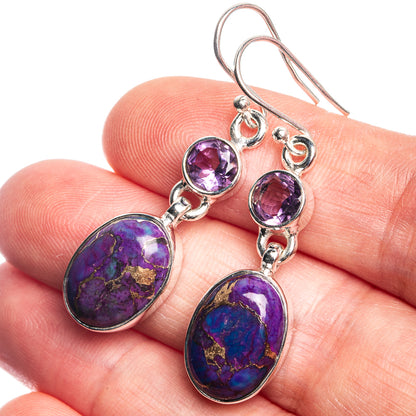 Sterling silver drop earrings with purple oval gemstone and round amethyst accents