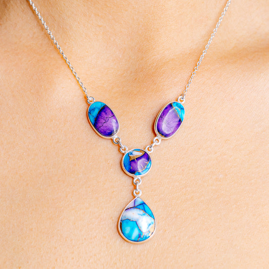 Sterling silver necklace with turquoise and purple teardrop pendants